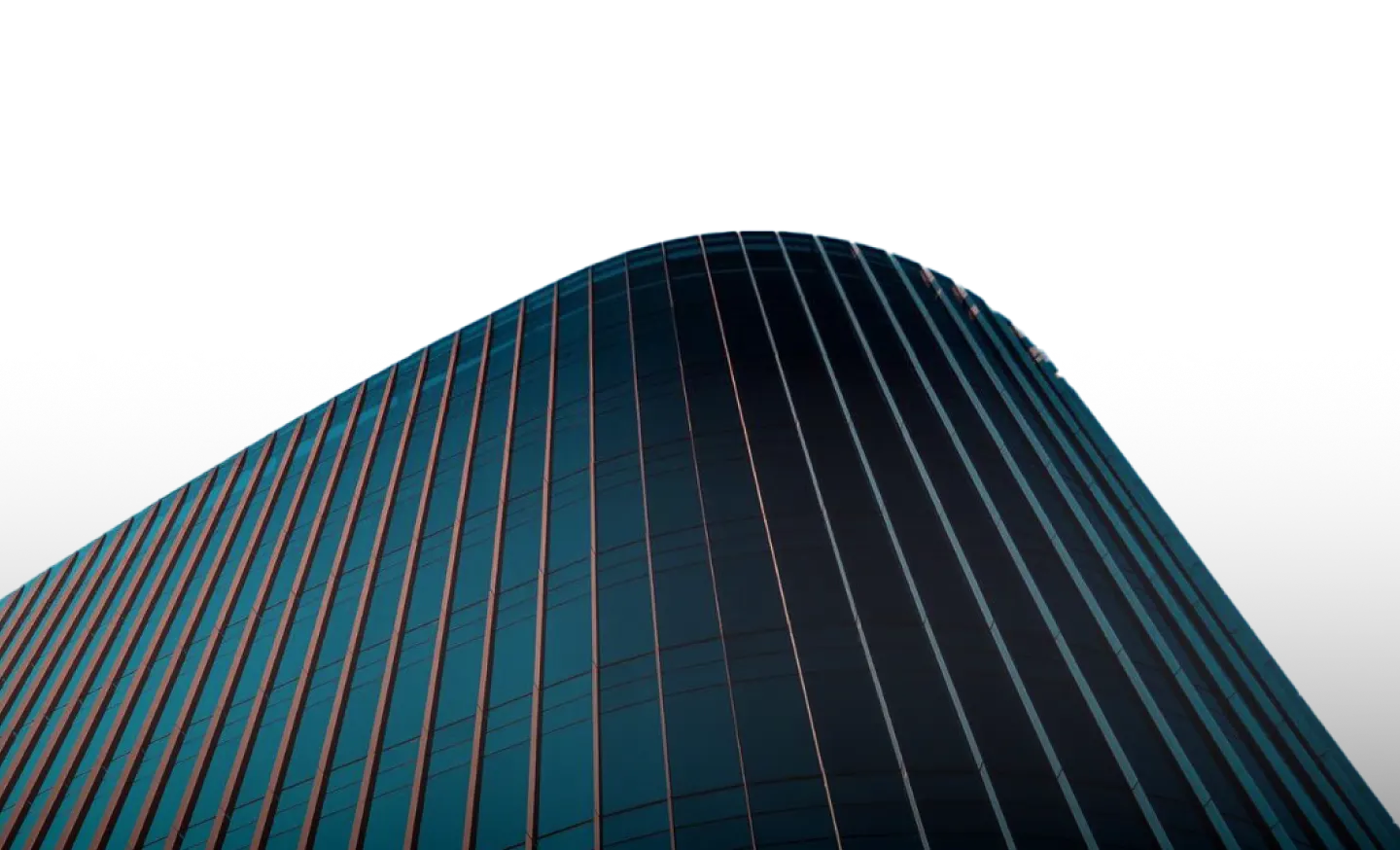 Modern glass building rising into a blue African sky